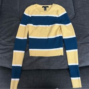 Blue, yellow, and white sweater